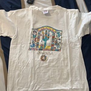 This is a medium white shirt from Jerzees